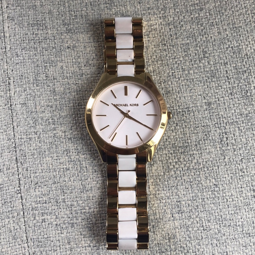 Gold and white Michael Kors watch